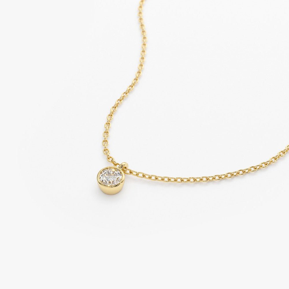 14K Gold Diamond Solitaire on a Bail - Image 9